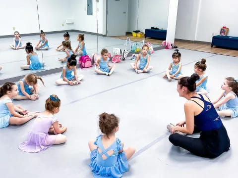 a group of people sitting on the floor