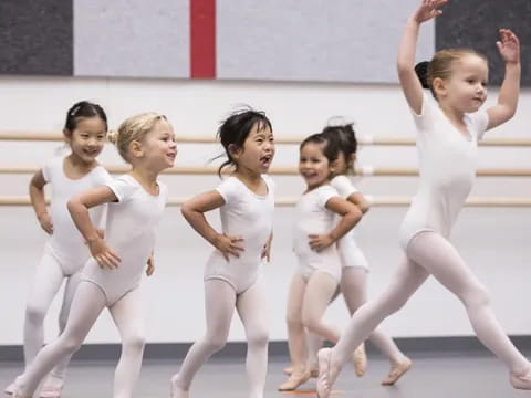 a group of girls dancing