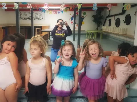 a group of girls posing for a picture