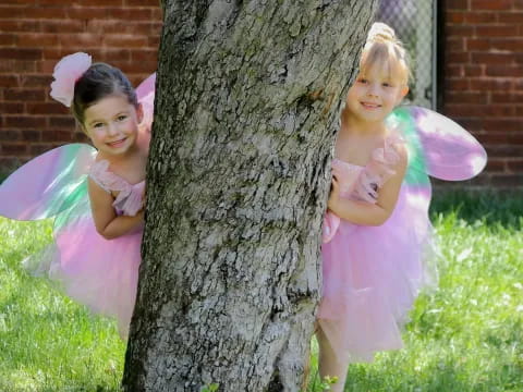 two girls in dresses