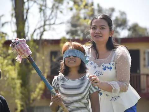 a woman holding a child