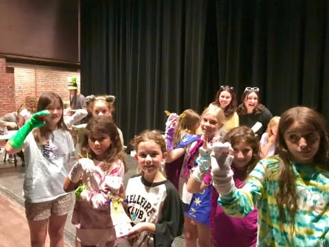 a group of children posing for a photo