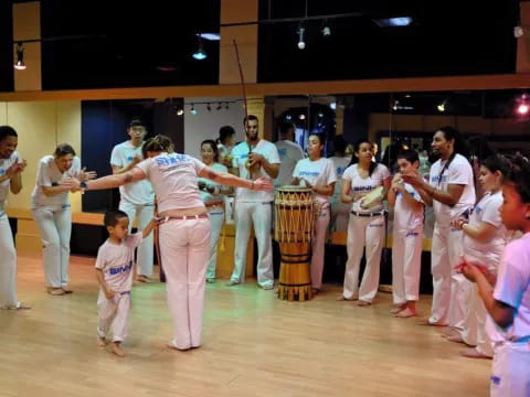 a group of people performing on a stage