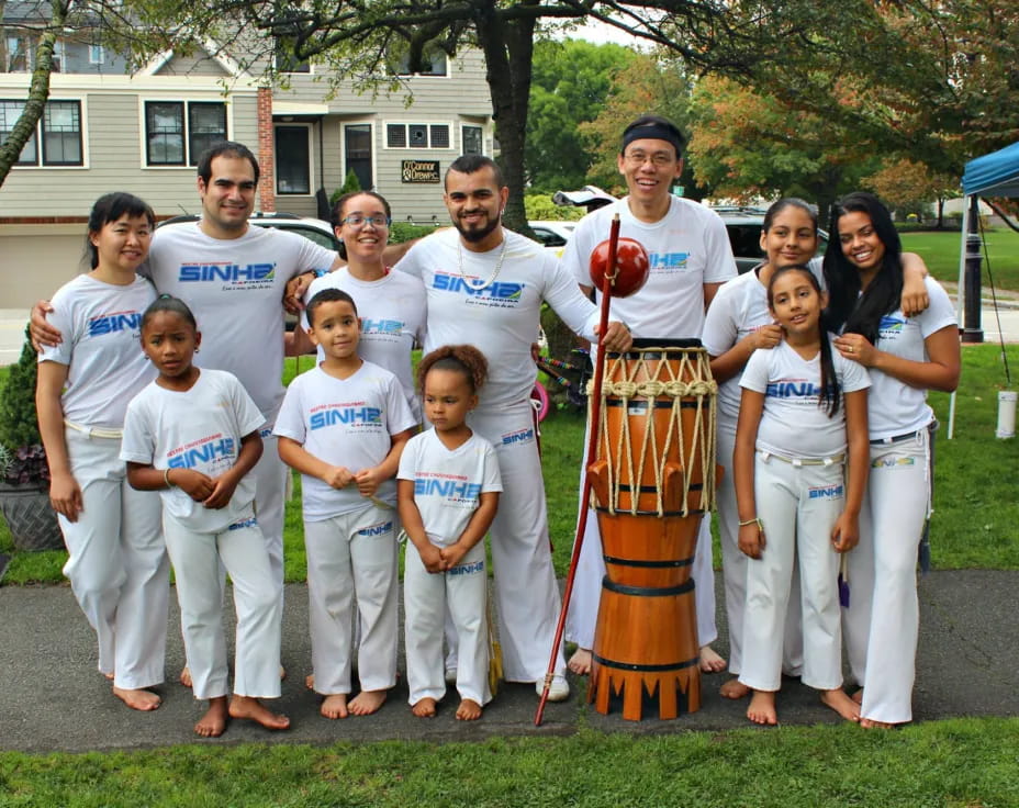 a group of people posing for a photo