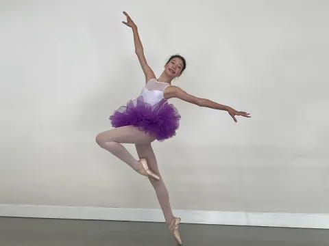 a woman dancing on a stage