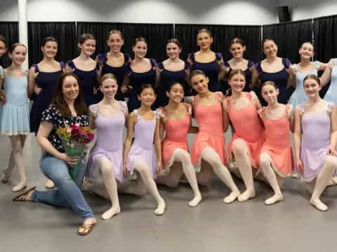 a group of women posing for a photo