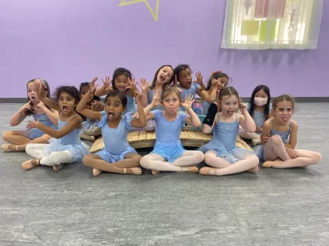 a group of girls posing for a photo