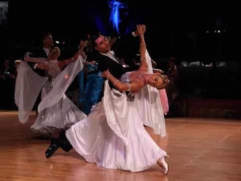 a man and woman dancing