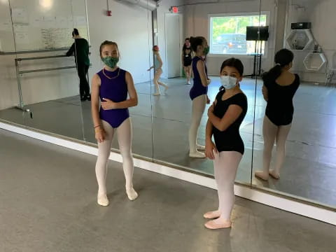 a group of women in a gym