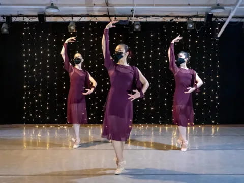 a group of women on a stage