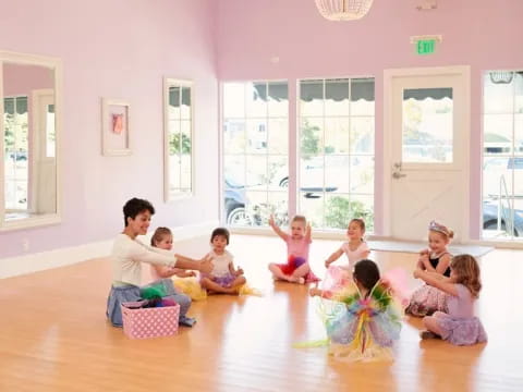 a group of children sitting on the floor