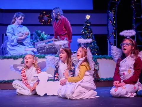 a group of children on a stage