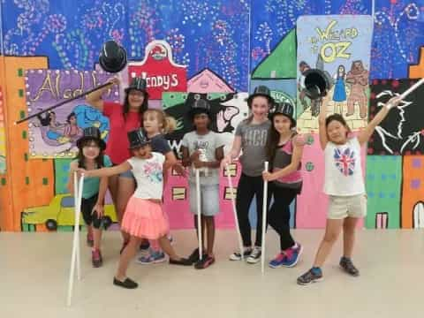 a group of kids posing for a photo