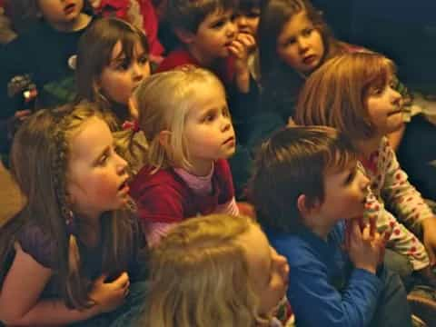 a group of children sitting together