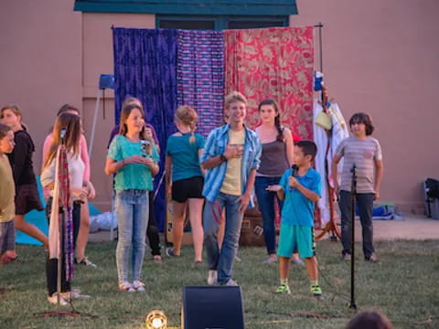 a group of children on a stage