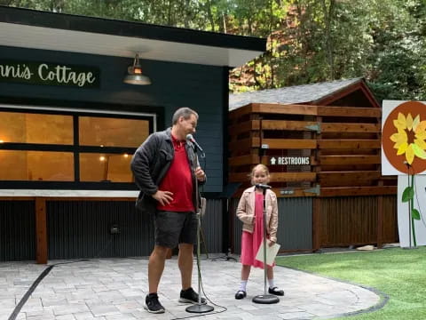 a man and a boy playing golf