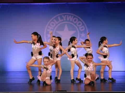 a group of girls on a stage