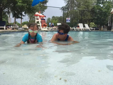 two people in a pool