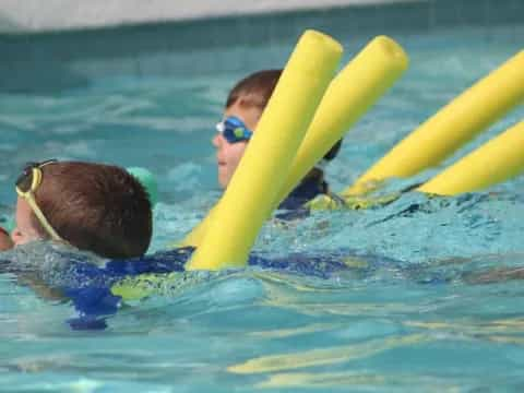 a group of people in a pool