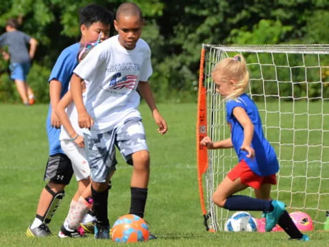 a group of kids playing football