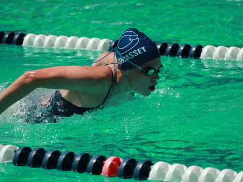 a person swimming in a pool