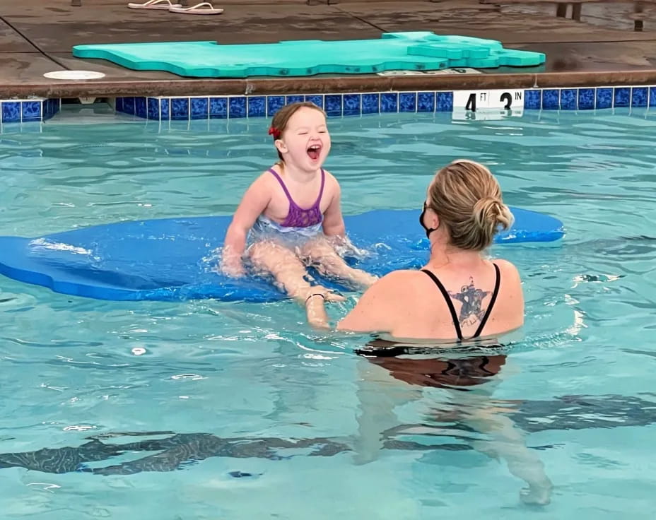 two women in a pool