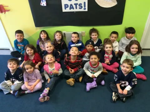 a group of children posing for a photo