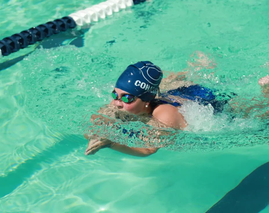 a person swimming in a pool