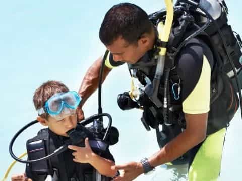 a couple of people in scuba gear