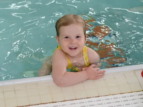 a child in a pool