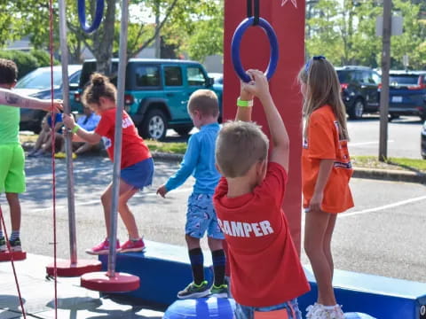 a group of kids playing with a toy