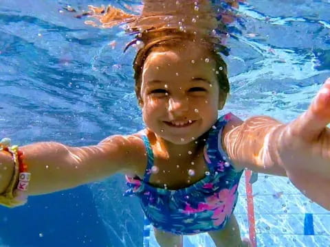 a girl in a pool