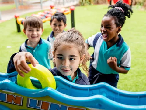 a group of kids on a playground