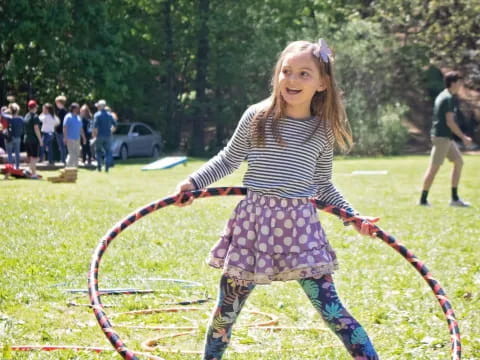 a girl holding a bow and arrow