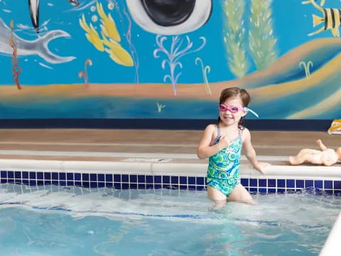 a girl in a pool