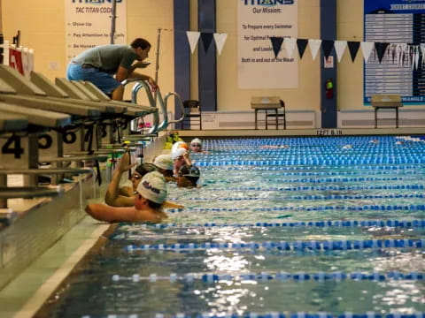 a group of people in a swimming pool