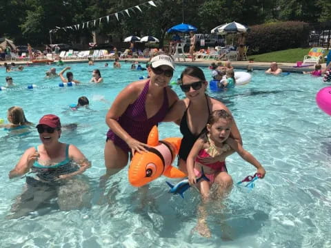 a group of people in a pool