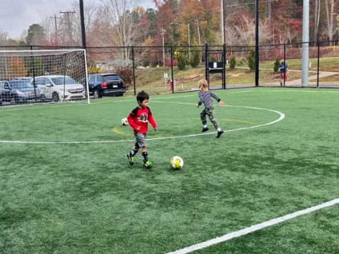 kids playing football on a field