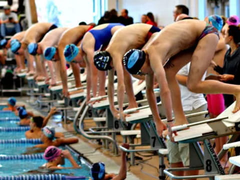 a group of people in a pool