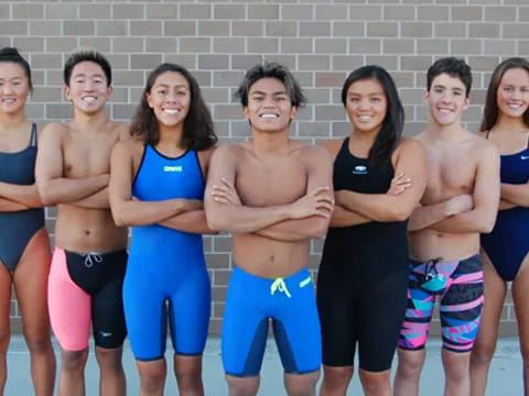 a group of people posing for a photo