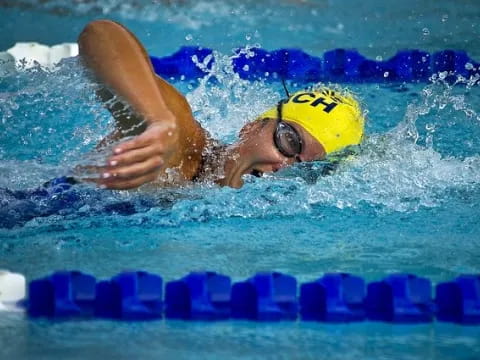 a person swimming in a pool