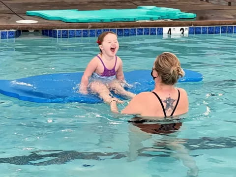 two women in a pool