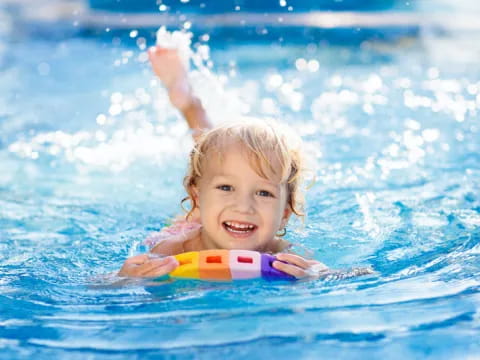 a child in a pool