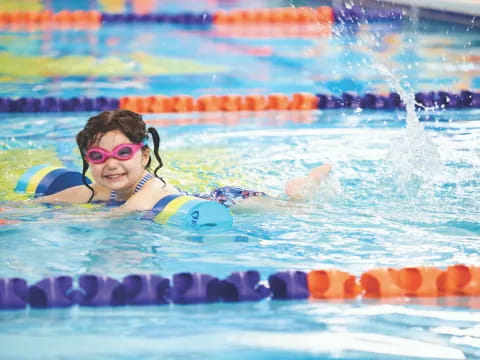 a man swimming in a pool