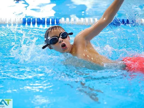 a person swimming in a pool