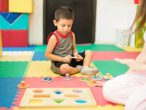 a baby playing with toys