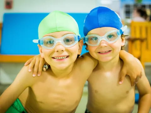 two boys wearing glasses