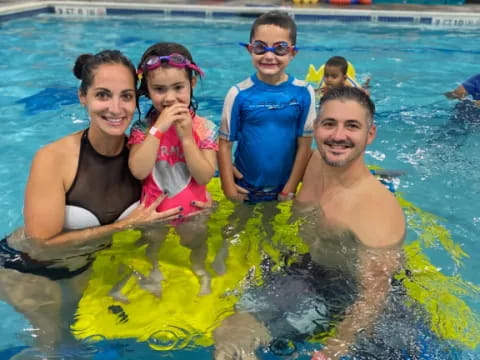 a group of people in a pool