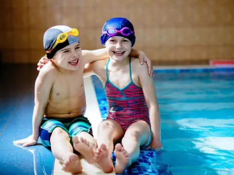two kids in a pool