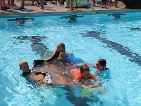 a group of people in a pool